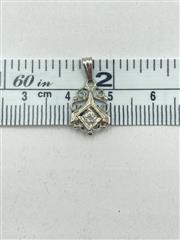 14K White Gold & Diamond Pendant Approx.10 CT. 0.8g